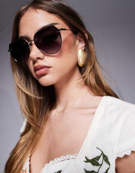 Quay – Main Character – Runde Oversize-Sonnenbrille aus schwarzem und goldfarbenem Metall - view 1