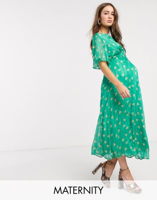 green flutter sleeve midi dress