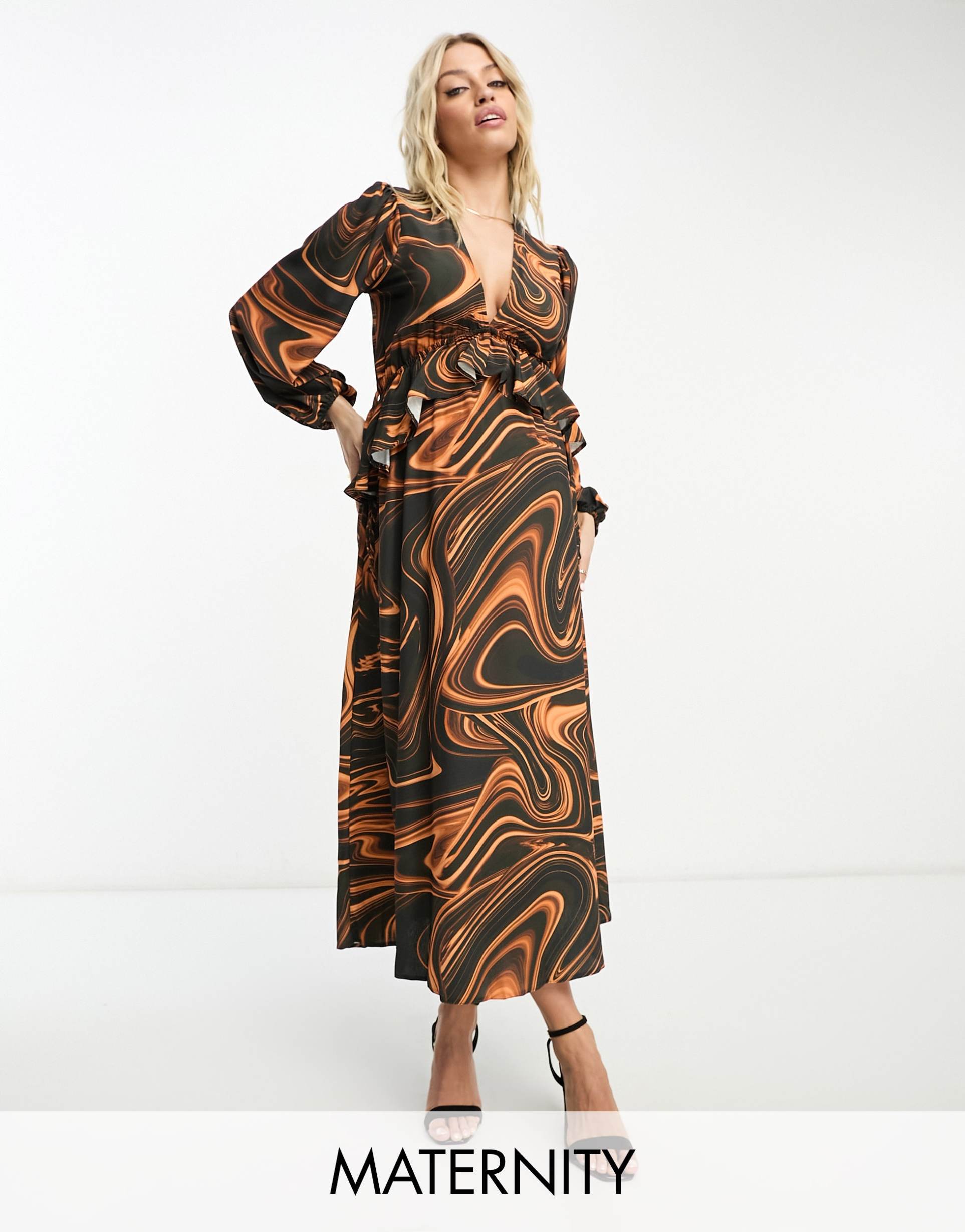 queen bee maternity ruched long sleeve dress in swirl print