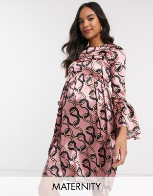 Queen Bee Maternity Skater Dress With Fluted Sleeve In Pink Chain Print-multi