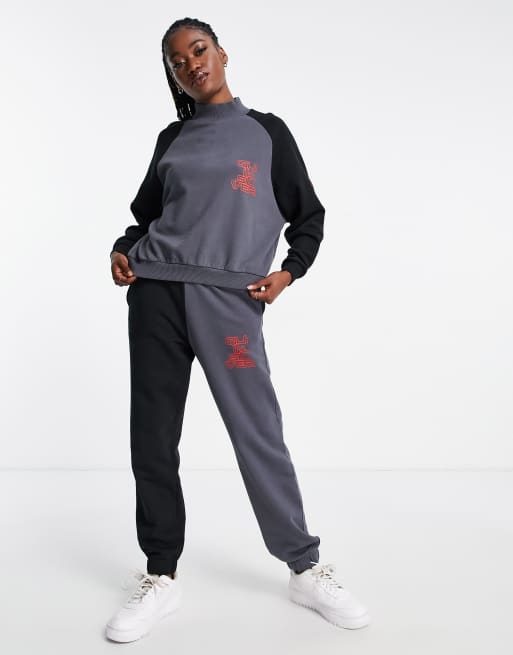 Nike stranger things on sale tracksuit