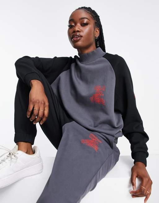 Quiksilver X Stranger Things Upside Down - Polartrøje i sort/grå