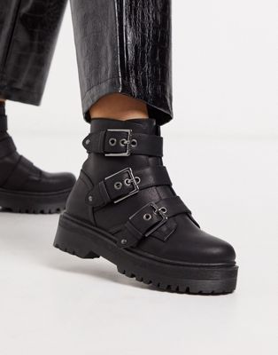 chunky black boots with buckles