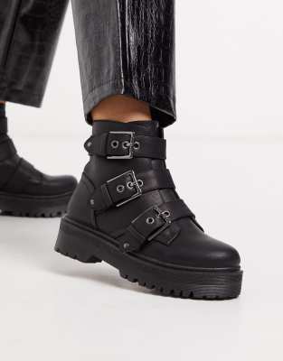 black flat boots with buckles