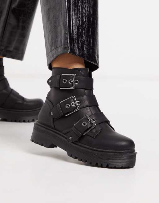 Black flat 2025 boots with buckles