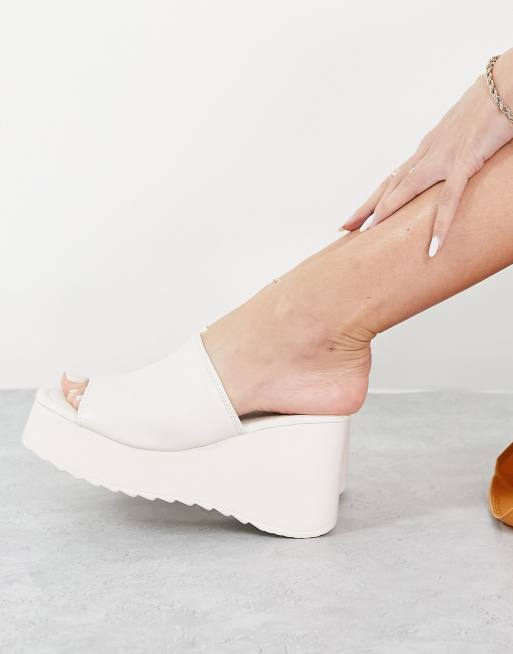 Flatform store mule sandals