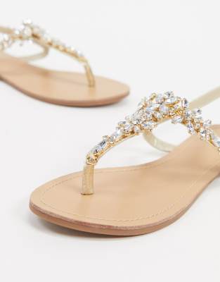 gold embellished flip flops