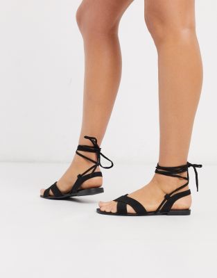 black ankle tie flat sandals