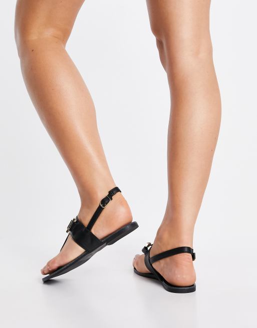 Qupid thong flat sandals in black