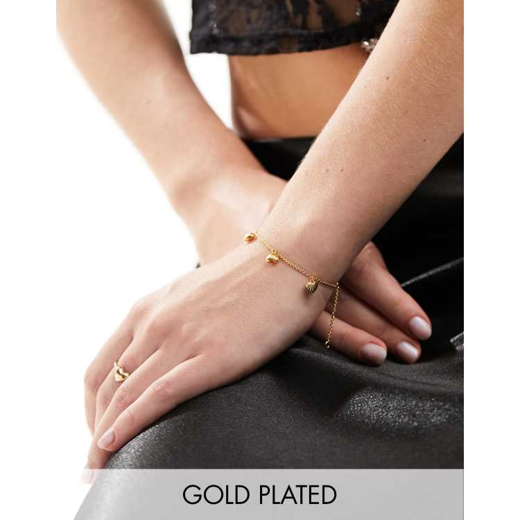 Rachel Jackson 22 carat gold plated mini heart charm bracelet ASOS