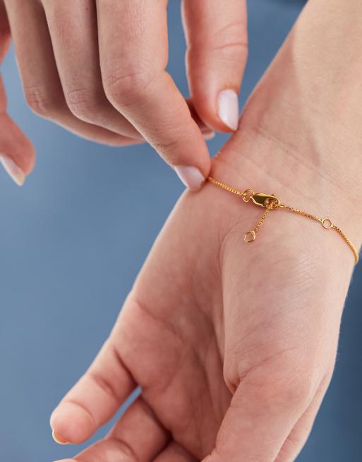 Rachel Jackson 22 karat gold plated happy face charm bracelet ASOS