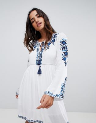 white embroidered tunic dress
