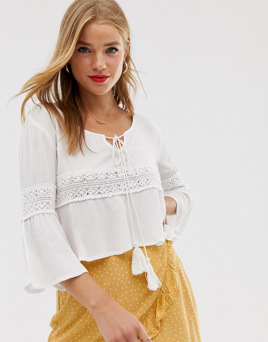 Raga - Playa Blanca - Cropped gestrikte blouse met kwastjes-Wit