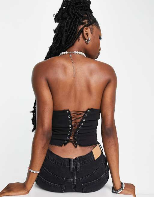 Corset tie outlet back