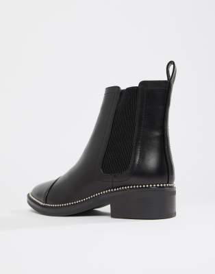 black spiked chelsea boots