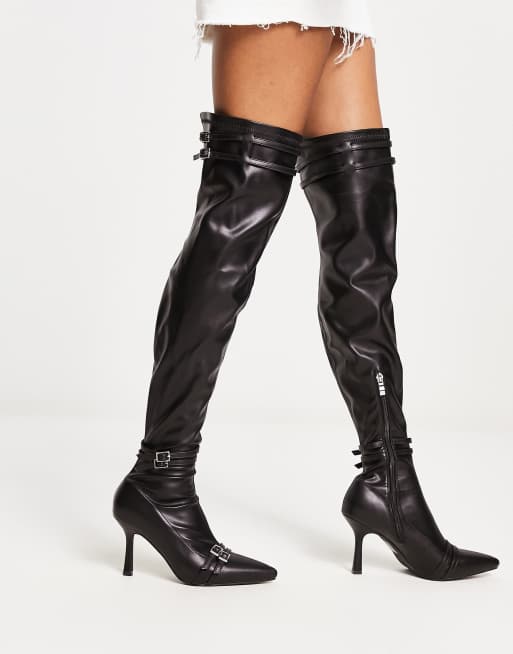 Thigh high clearance boots with buckles