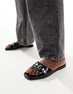 Celini flat sandals in black patent