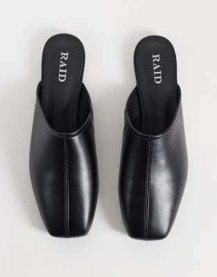 Raid Delta Slip On Mules In Black
