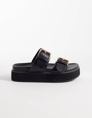 RAID - Dinnie - Sandalen in Schwarz mit flacher Plateausohle und Schnalle