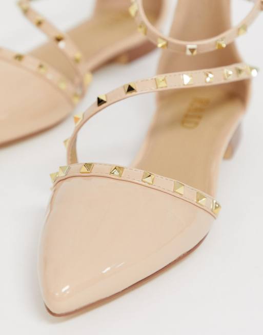 Nude store studded flats