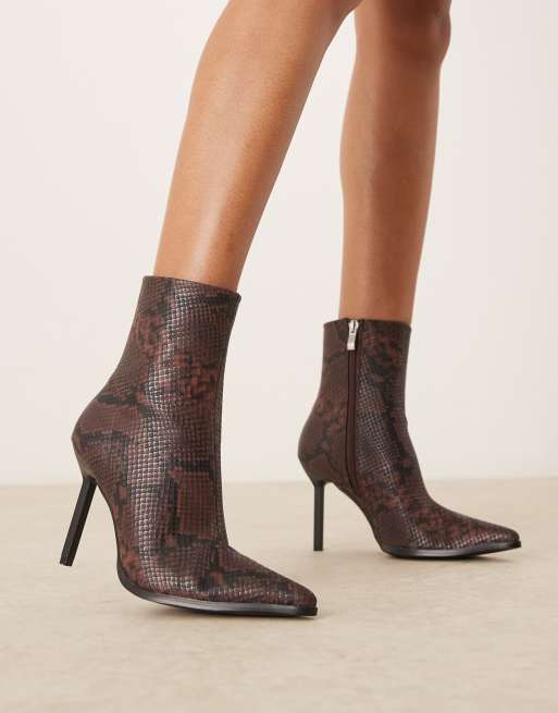 RAID Elvio heeled ankle boots in snake ASOS