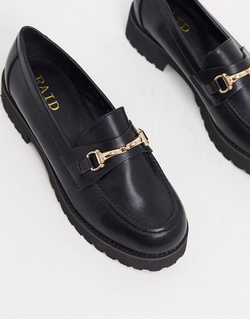 RAID Empire chunky loafers in black with gold snaffle