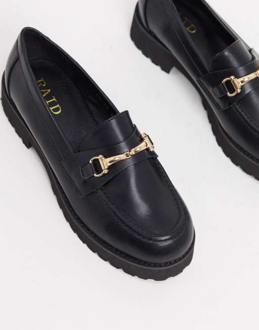 Black loafers store with gold