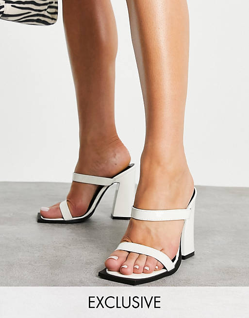 RAID Exclusive Megha block heeled mules with square toe in off white