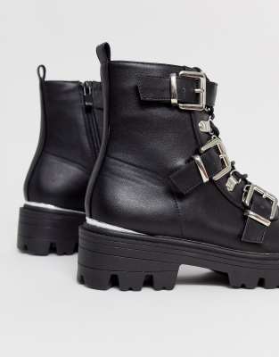 black flat buckle boots