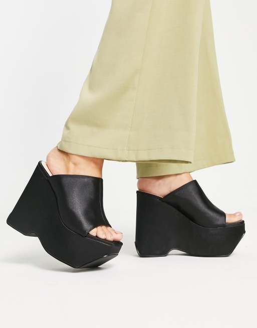 Raid Ferris platform heel mules in black satin