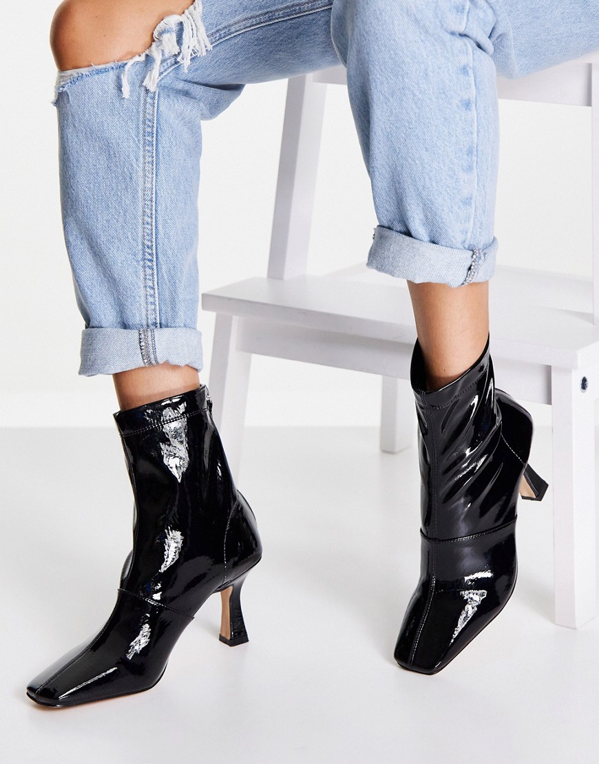 RAID Izzy mid heel ankle boots in black crinkle patent