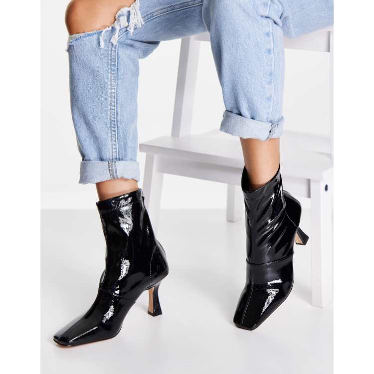 Black patent store low heel boots