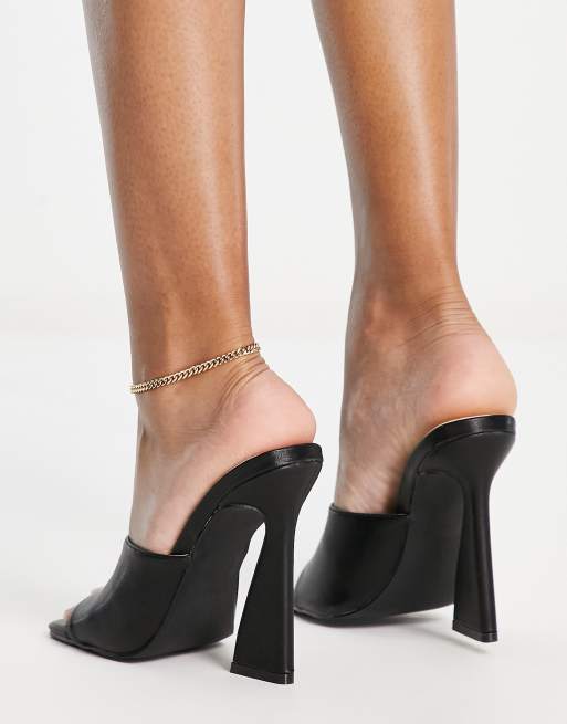 Platform store heel mules