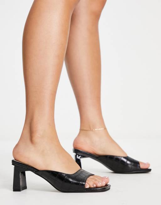 Black mid store heel mules