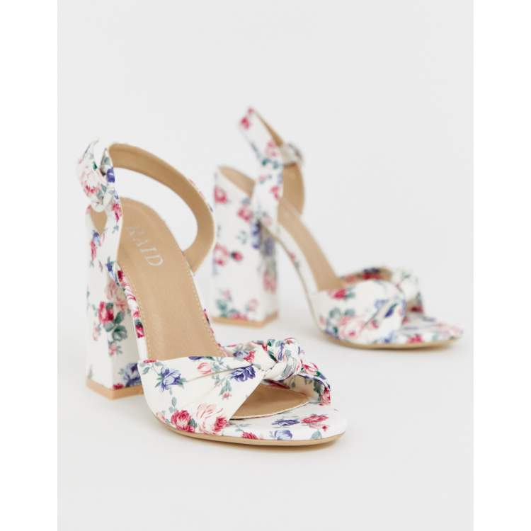 Floral block outlet heel pumps