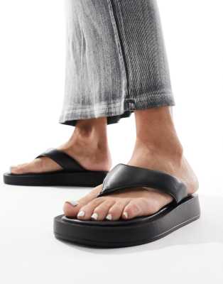 Mellow flatform flip flops in black