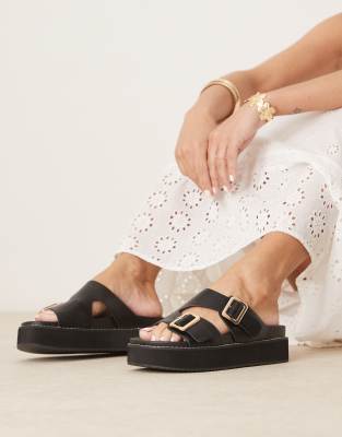 Narina asymmetric double buckle flatform sandals in black