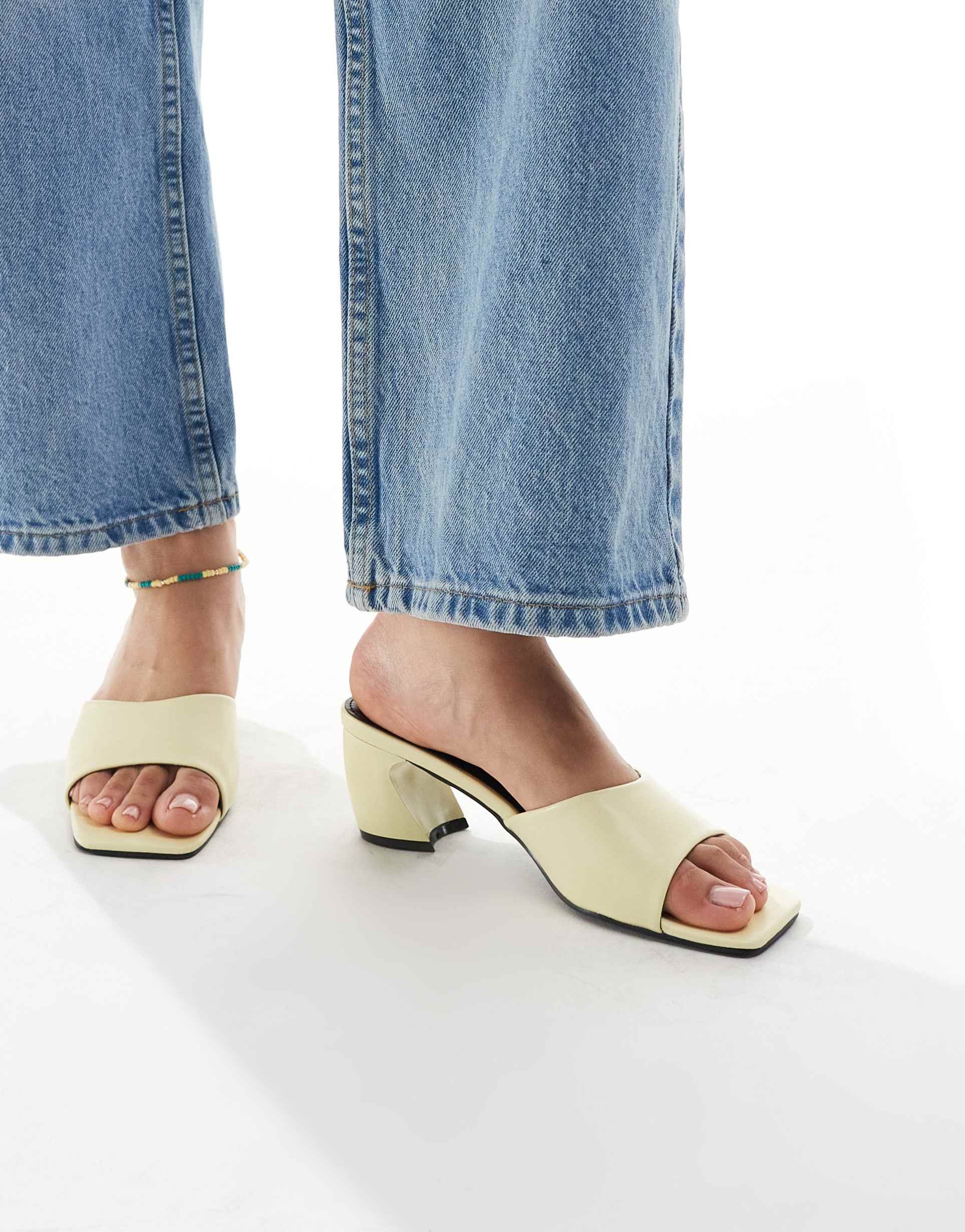 raid saanvi block heeled mules in butter yellow