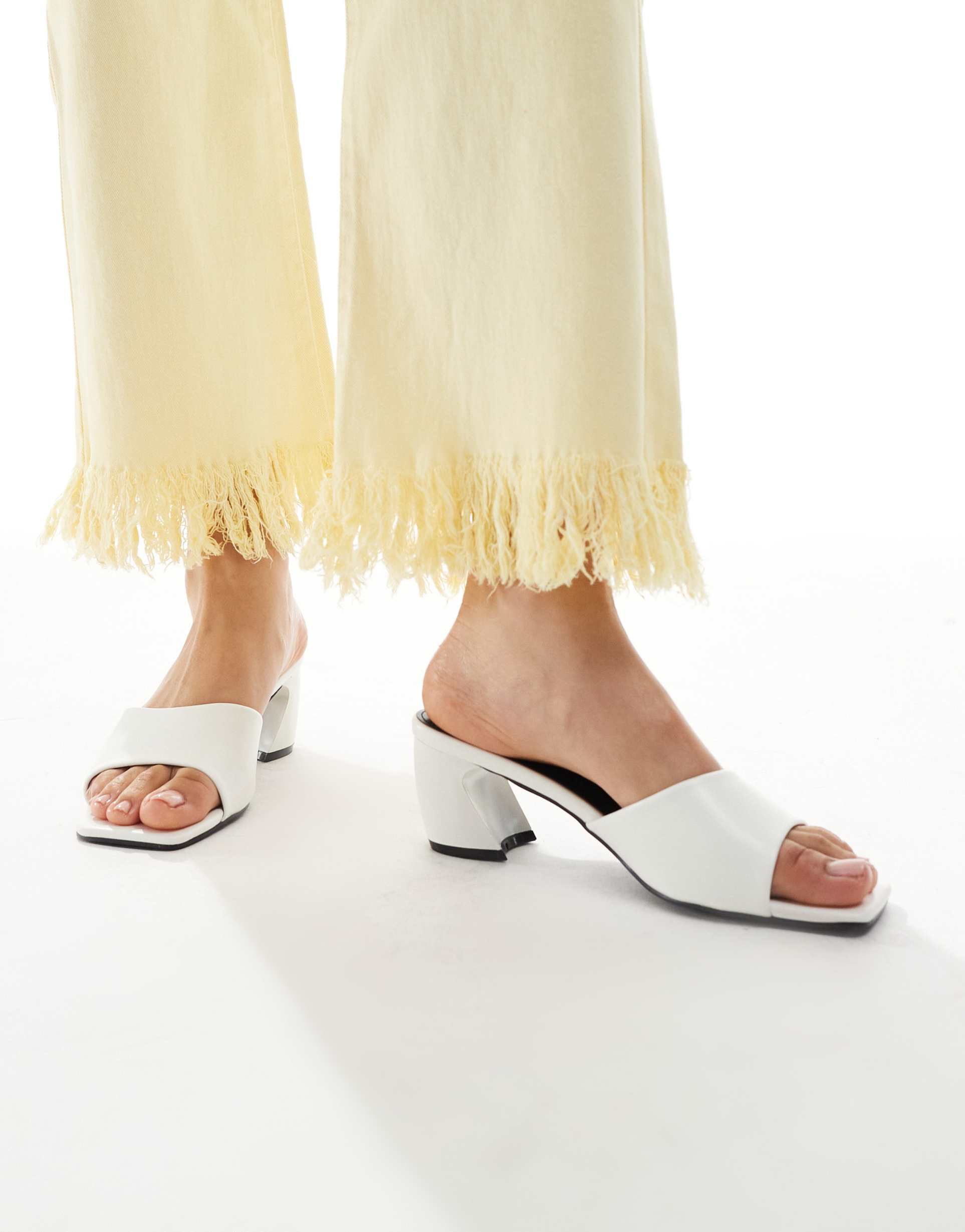 raid saanvi block heeled mules in white