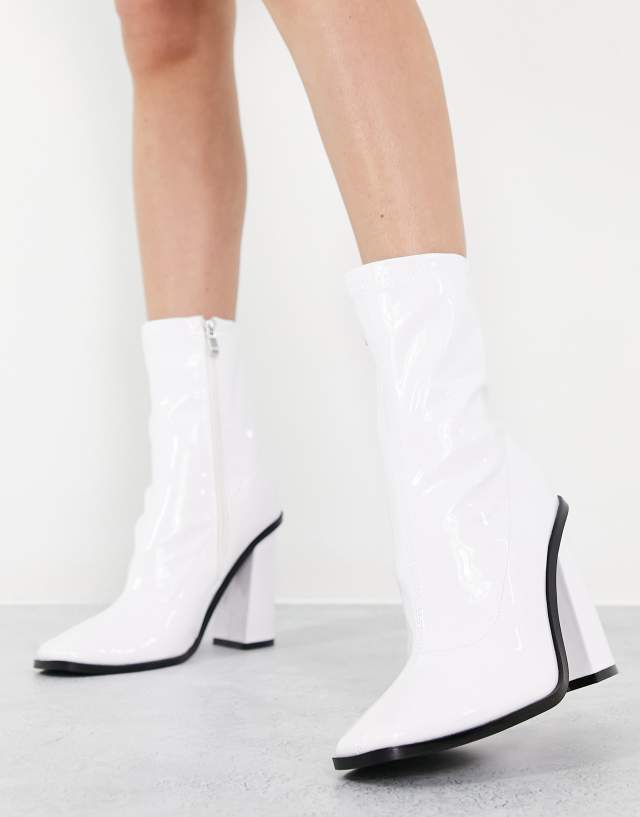 RAID Saylor block heel sock boot in white patent