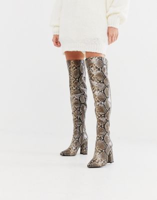 snakeskin high knee boots
