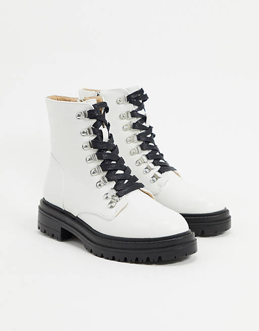 RAID Sofia flat lace up boots with eyelet detail in white | ASOS