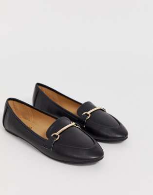 black leather flat shoes