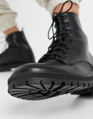 flat lace up black boots