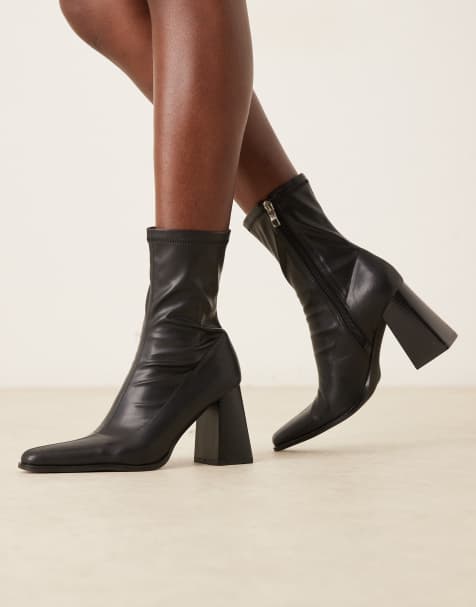 RAID Whisper block heeled ankle boots with pointed toe in black - view 1