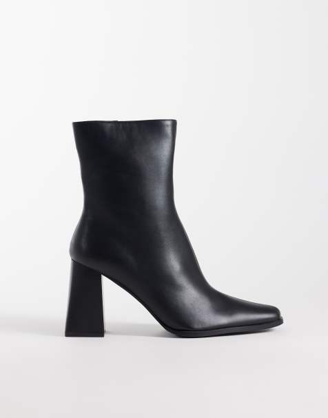RAID Whisper block heeled ankle boots with pointed toes in black - view 1