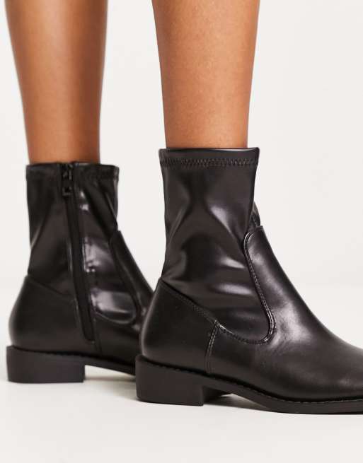 Raid phillipa black pointed sock hot sale ankle boots