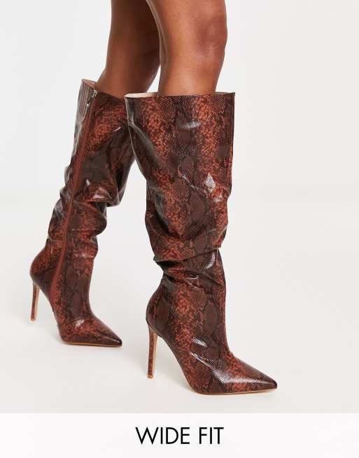 https://images.asos-media.com/products/raid-wide-fit-brayden-stiletto-knee-boots-in-tan-snake-print/202404807-1-snakeprint?$n_640w$&wid=513&fit=constrain