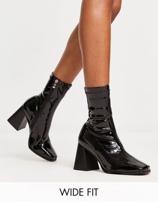 RAID Wide Fit Clever mid heel sock boot in black patent - ASOS Price Checker
