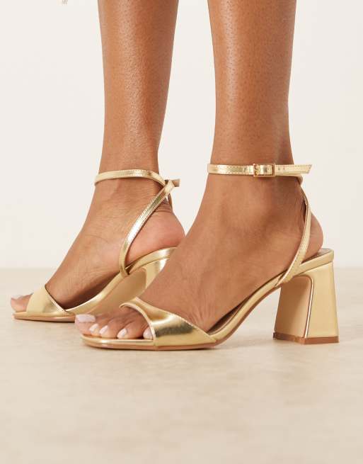 RAID Wide Fit - Cora - Sandali con tacco largo color oro a pianta larga